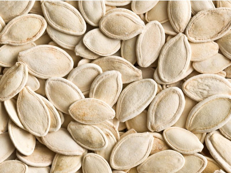 benefits of pumpkin seeds: A close-up view of fresh pumpkin seeds, ready to snack on.